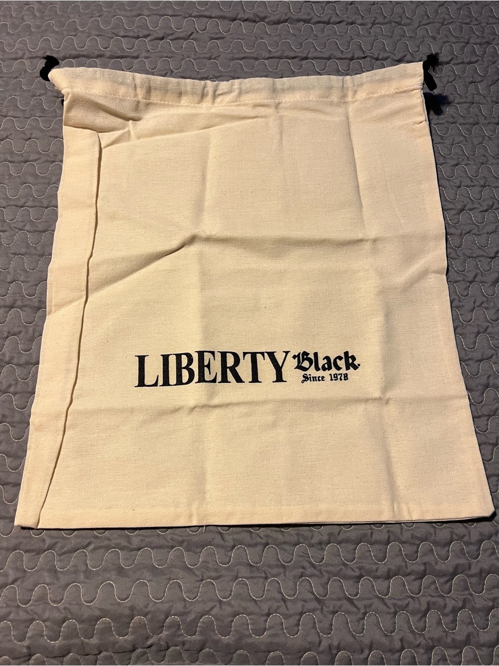 LIBERTY Black Cream Canvas Drawstring Bag with Black Logo